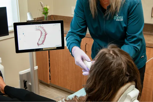 patient getting teeth scanned