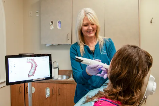patient getting teeth scanned