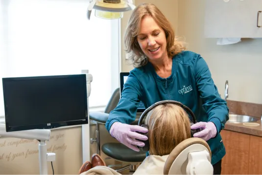 doctor giving patient ear phones