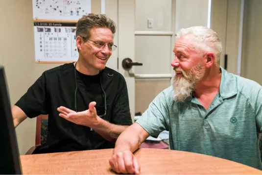doctor and patient smiling