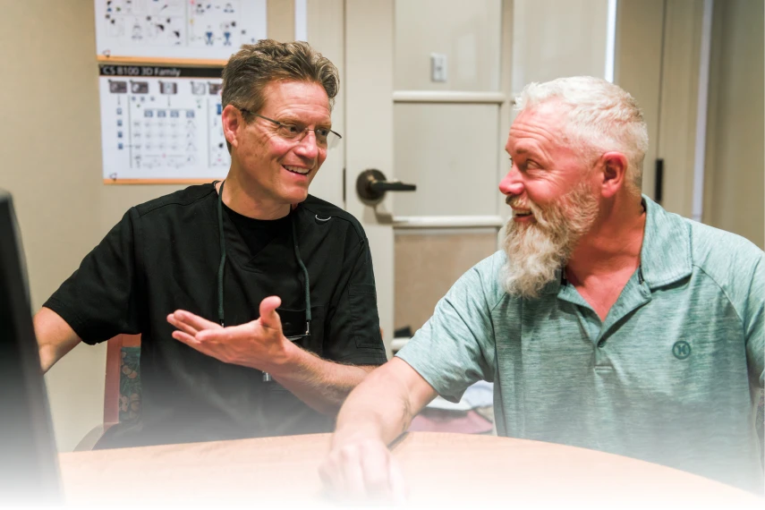 Dr. Johnson talking to a patient